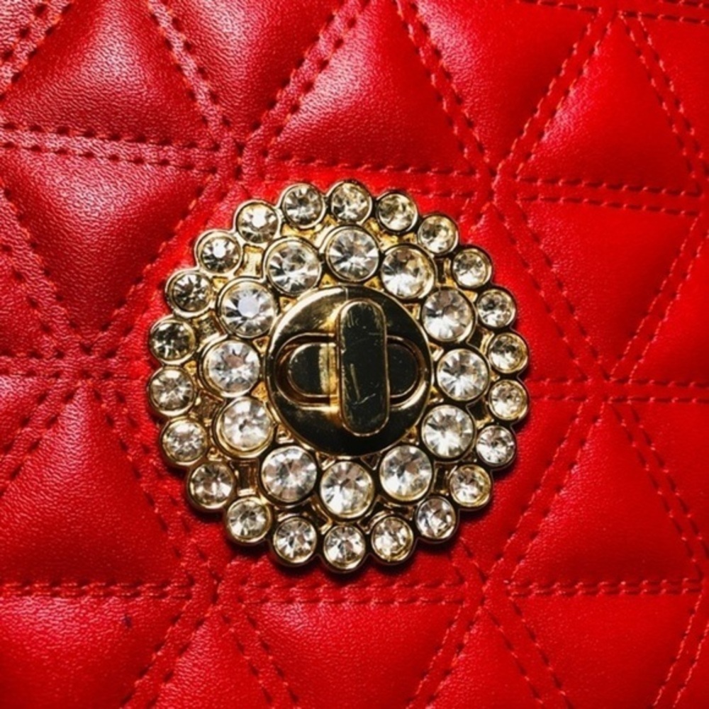 Red evening bag. Long gold strap